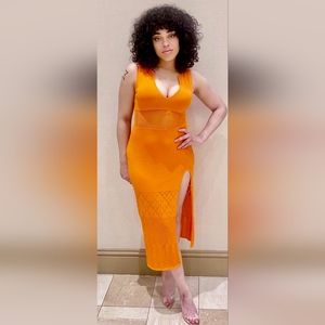 Maxi dress featuring a plunging neckline, mesh detailing and side split. 